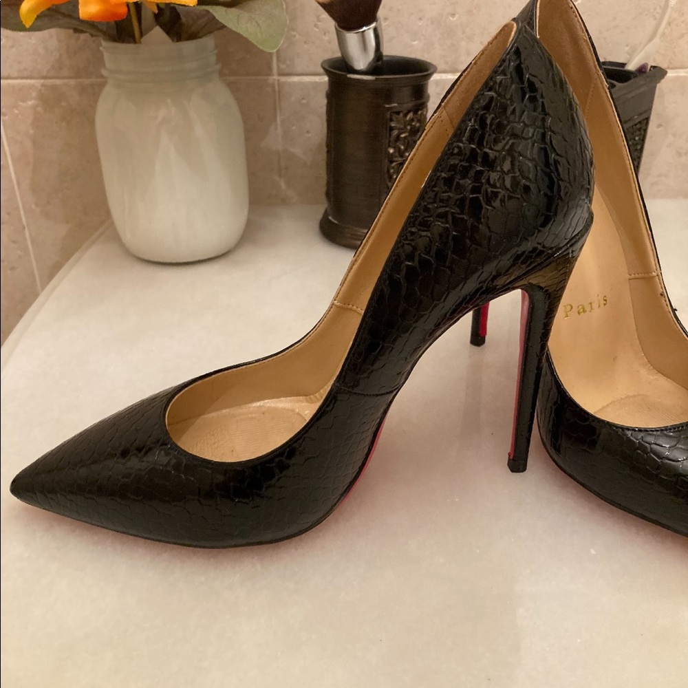 Christian Louboutin’s size 38 with dust bag